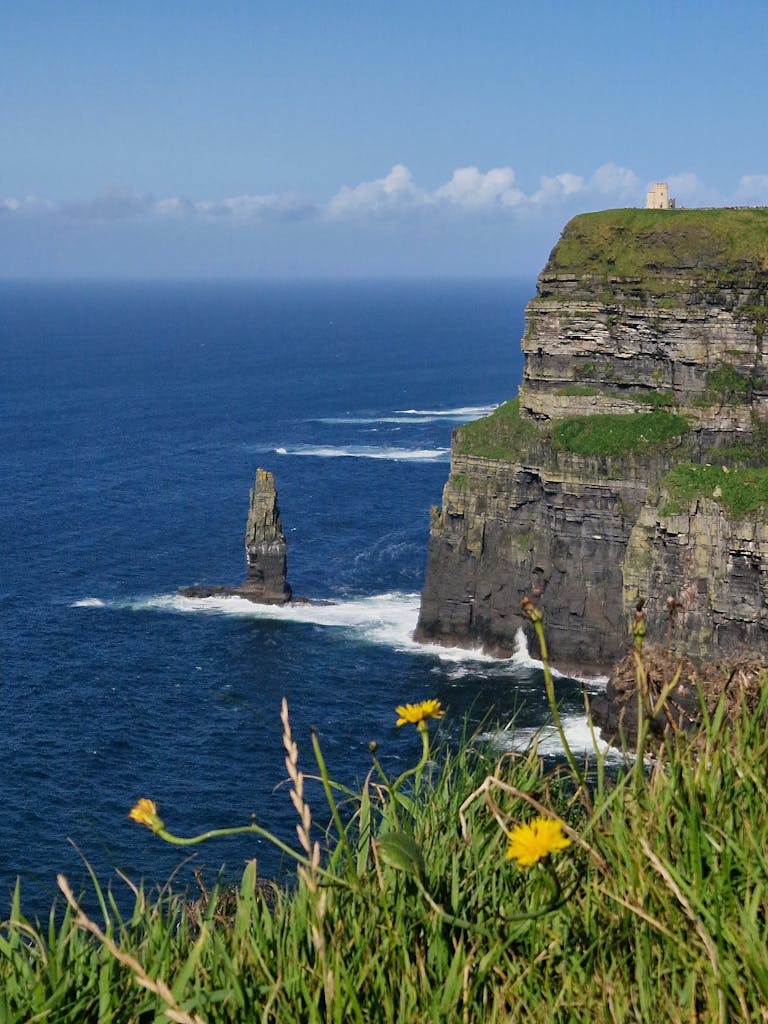 Majestic Cliffs of Moher overlooking the Atlantic Ocean in Ireland, a popular natural landmark.